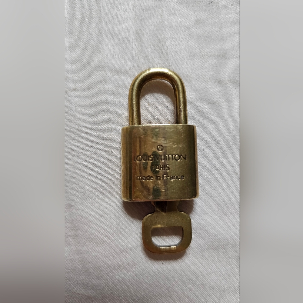 Louis Vuitton Elegant Gold Padlock